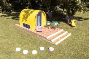 Yellow glamping Pod with stepped decking